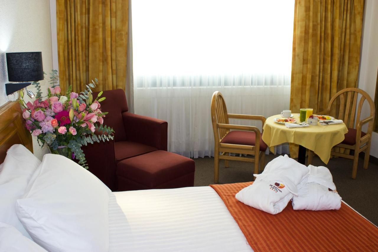 San Juan Park Hotel Сан-Хуан-дель-Ріо Екстер'єр фото A room at the hotel