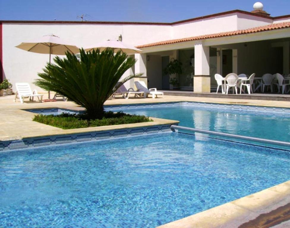 San Juan Park Hotel Сан-Хуан-дель-Ріо Екстер'єр фото A swimming pool
